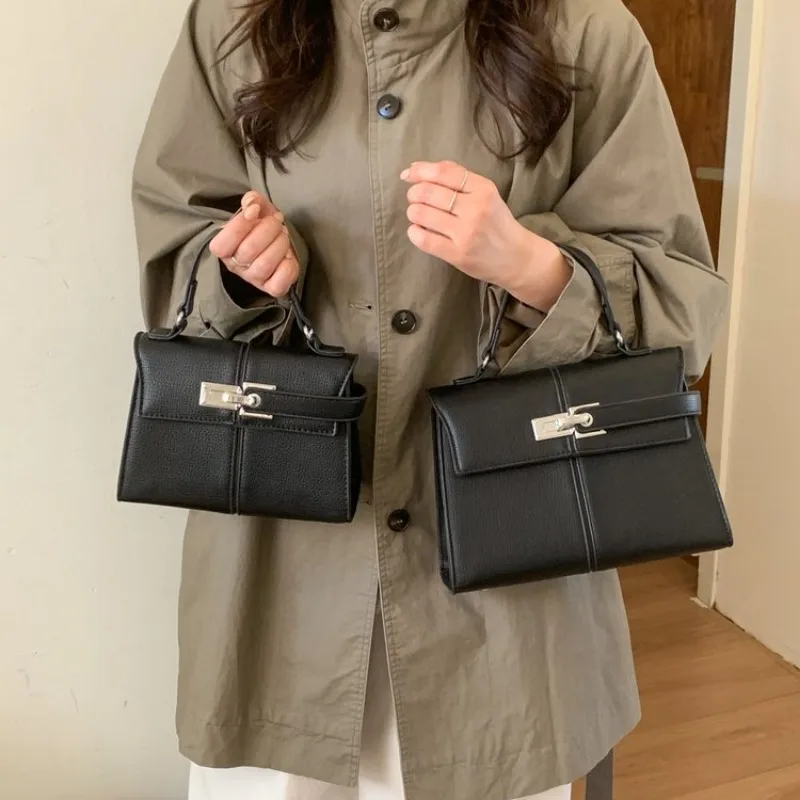 エレガントなミニマリストおむつバッグハンドバッグバックパック - Leatherwork Essentials のレビューと価格
